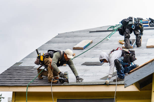 Professional Gutter Installation technician working in Line Lexington, PA